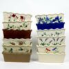 Selection of stoneware pottery Large Loaf Pans in multiple glazes and hand-painted designs.