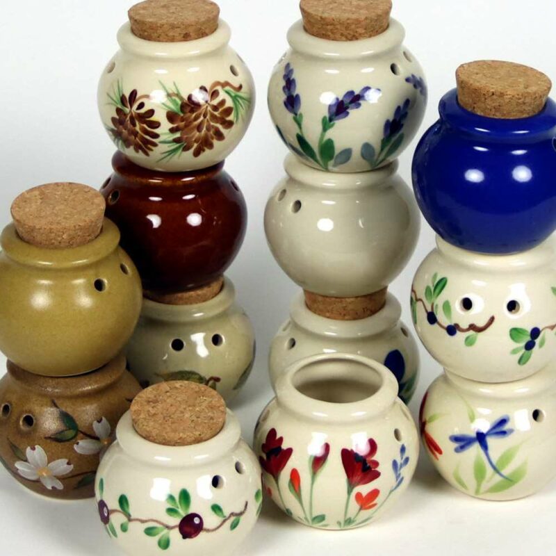 Selection of stoneware pottery Storage Jars in multiple glazes and hand-painted designs.