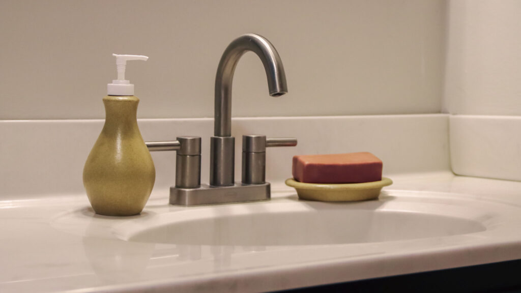 Go Green Earthware soap dish and lotion bottle help reduce plastic waste